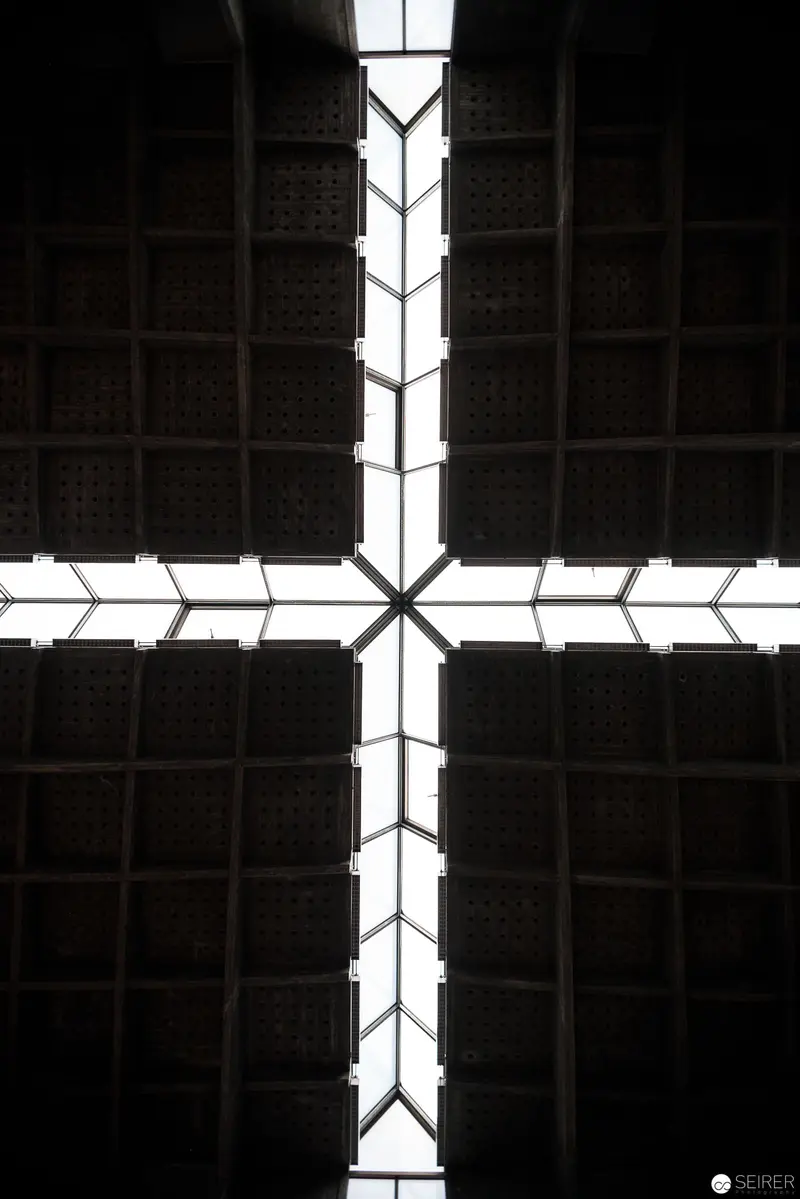Architectural Cross-Section: Geometric White Intersecting Lines Against Dark Grid