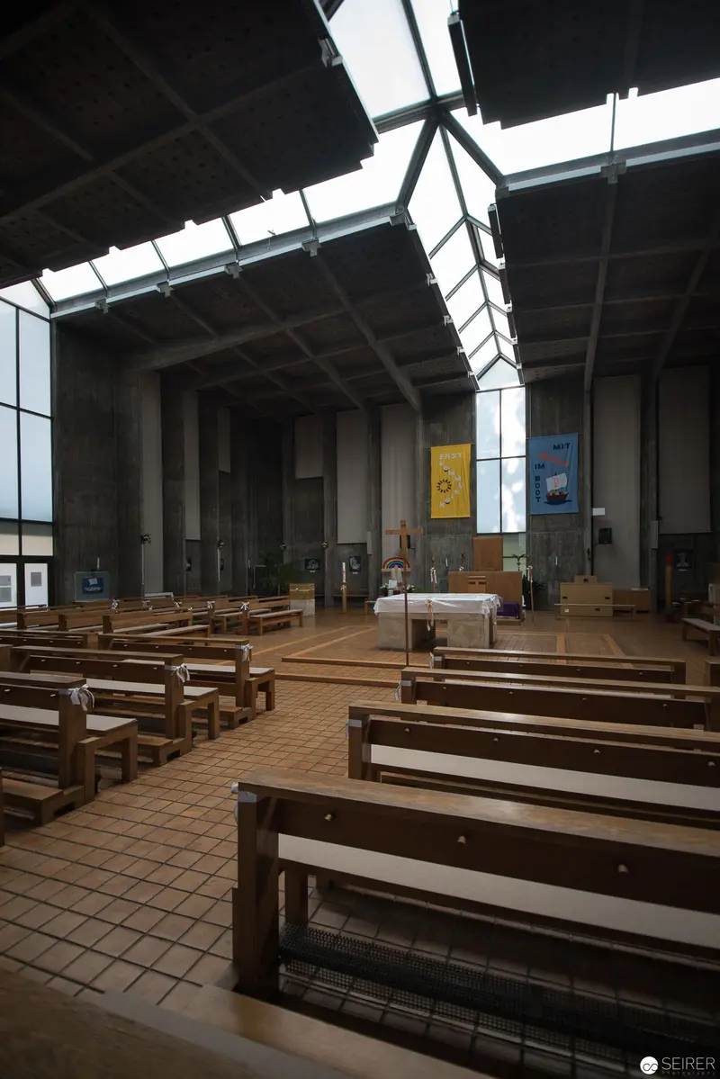 Modern Church Interior at Oberbaumgarten Parish, Vienna with Geometric Skylight Design