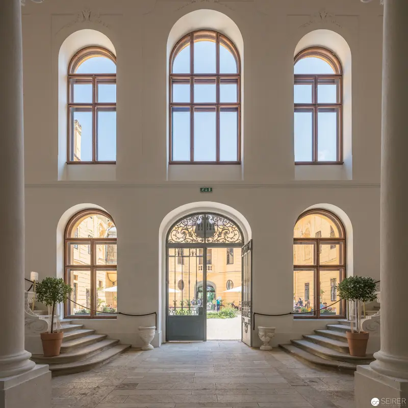 Elegant Arched Entrance Hall with Neoclassical Architectural Elements at Schloss Eckartsau