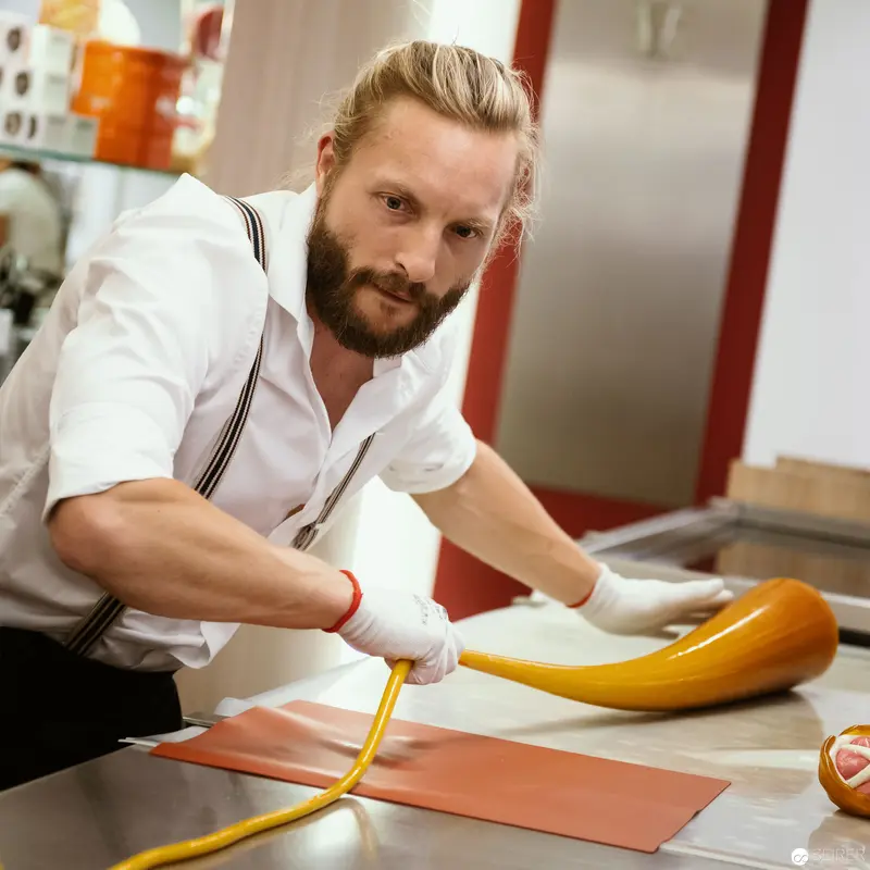 Pastry Chef Crafting Confectionery Artwork at Zuckerlwerkstatt in Vienna's Historic Center