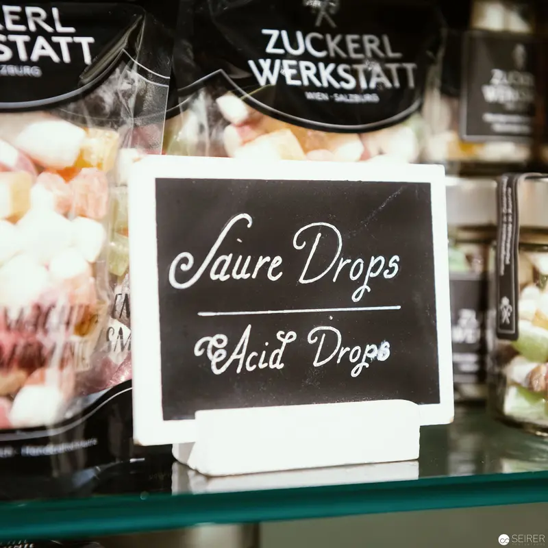 Saure Drops: Artisanal Confectionery Signage at Zuckerlwerkstatt Vienna
