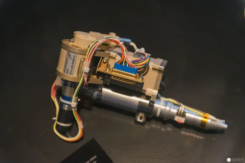 Precision Machinery: Intricate Robotic Injection Mechanism with Multicolored Wiring