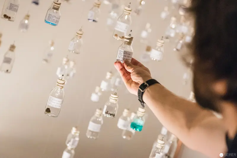 Asteroid Day Exhibition: Suspended Water Bottles at Naturhistorisches Museum Wien