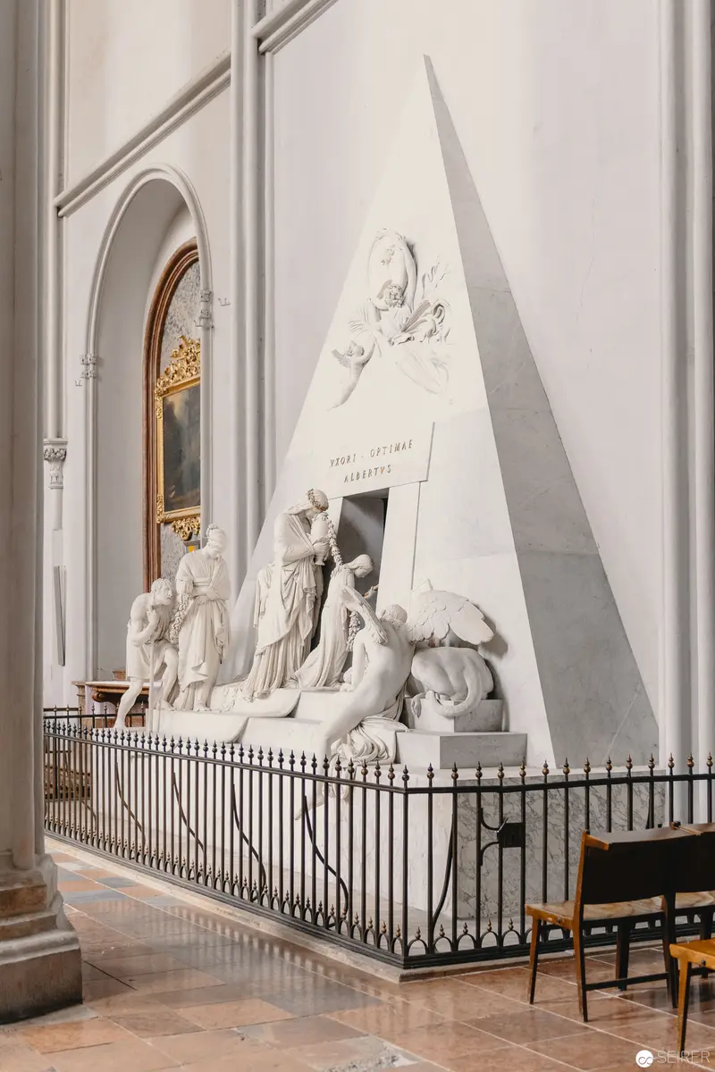 Monumental Marble Memorial Sculpture Within Neoclassical Architectural Interior