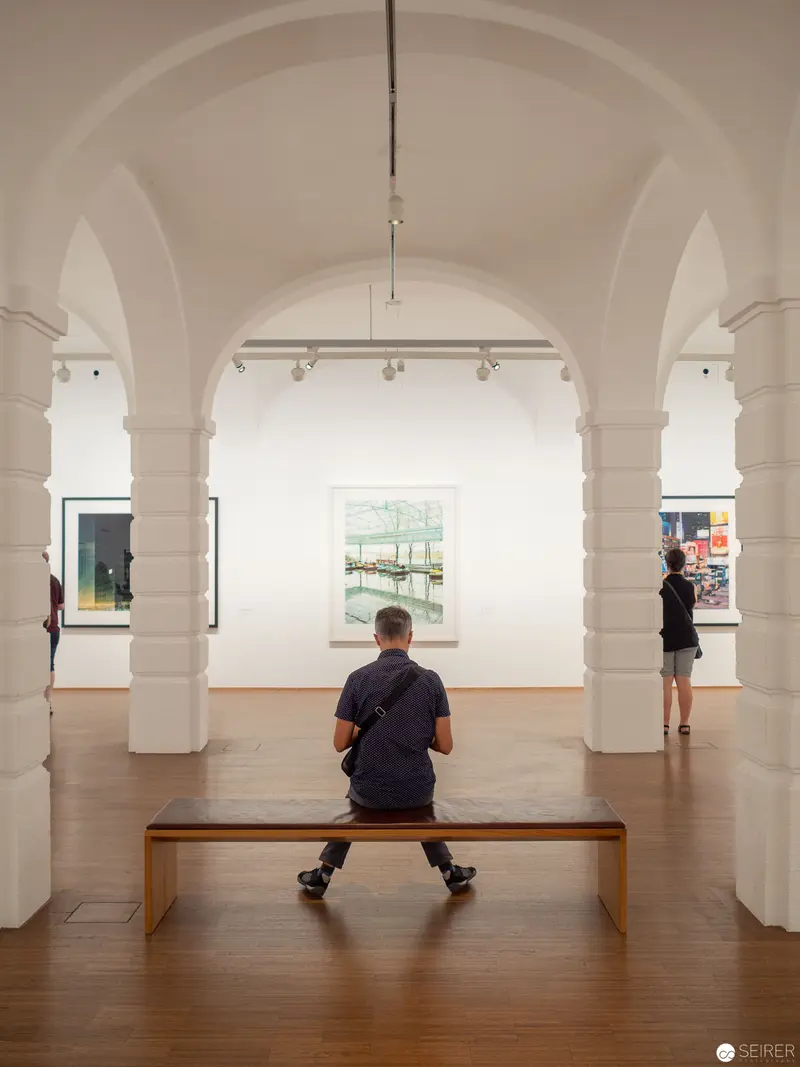 Contemplative Moment in Alfred Seiland Exhibition at Albertina Museum Gallery