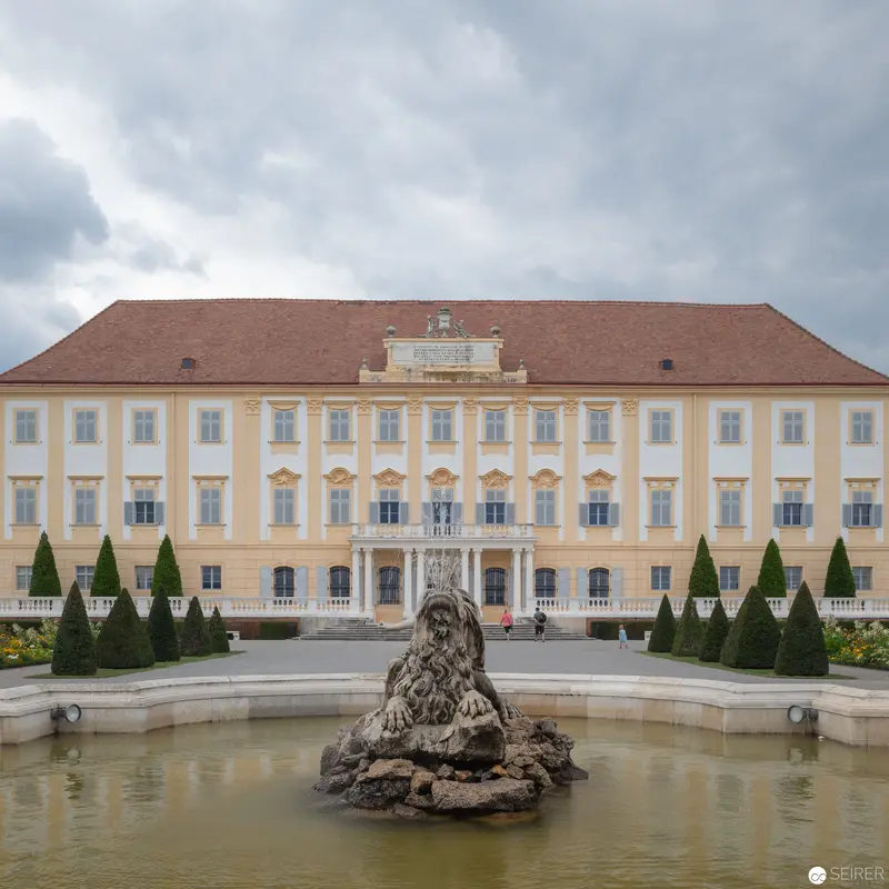 Baroque Palace Facade with Rococo Fountain in Symmetrical Landscape Composition
