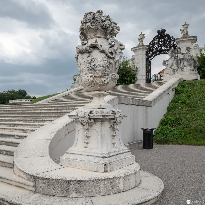 Baroque Staircase with Ornate Sculptural Elements at Palatial Grounds