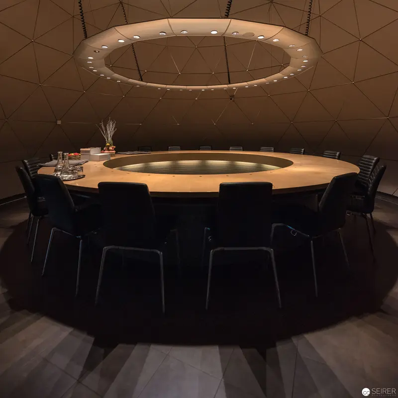 Minimalist Circular Conference Table in Geometric Dome Interior