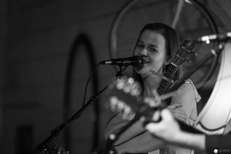 Intense Musical Performance in Black and White Monochrome Stage Scene
