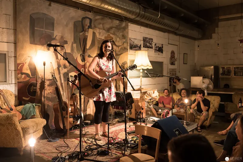 Intimate Acoustic Performance in Rustic Industrial Basement Venue