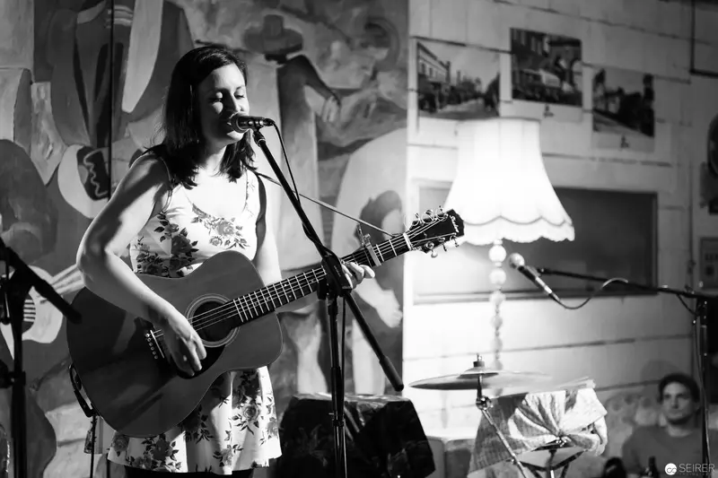 Acoustic Performance in Intimate Black and White Venue Setting