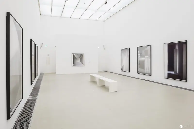 Eva Schlegel's "Spaces" Exhibition: Minimalist Gallery Interior with Monochromatic Photographic Displays