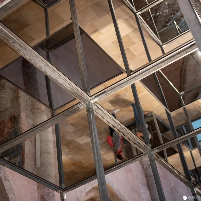 Fractured Reflections: Geometric Glass Structure in Eva Schlegel's "Spaces" Exhibition