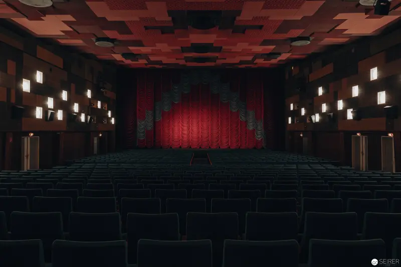 Empty Austrian Cinema Hall with Red Curtain at Gartenbaukino