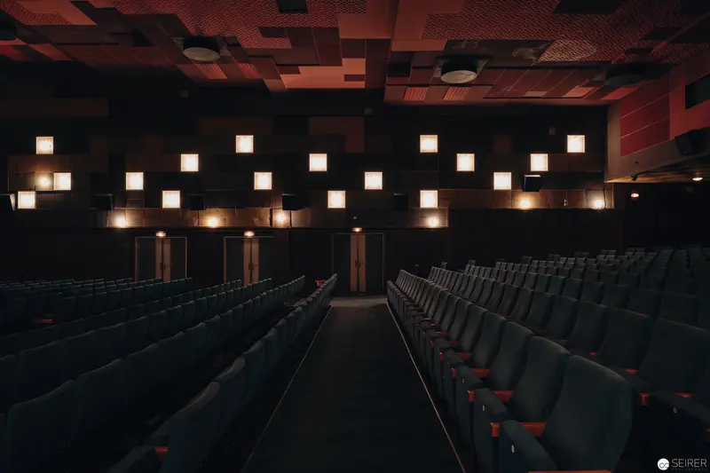 Empty Austrian Cinema Hall with Geometric Illuminated Wall Design in 70mm Projection Space