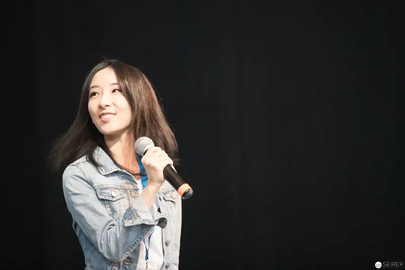 Haruka Performing Live at AniNite 2018 with Microphone and Denim Jacket