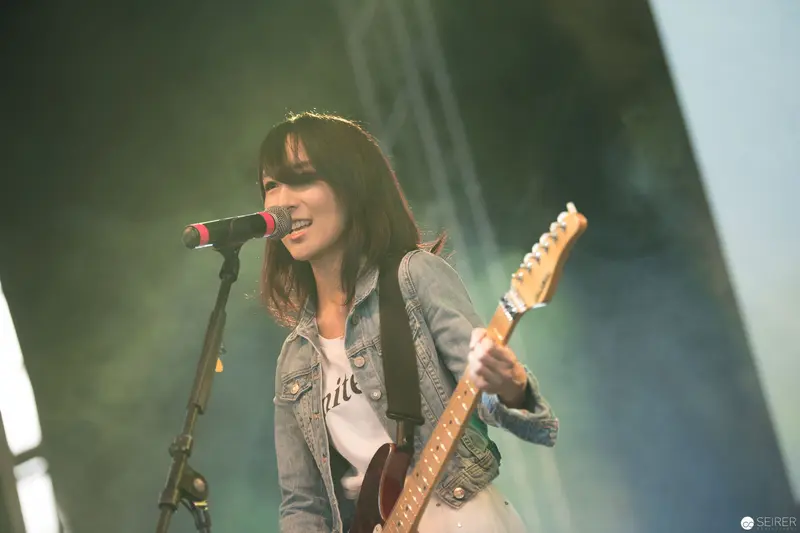 Haruka Performing Live at AniNite 2018 with Electric Guitar and Microphone