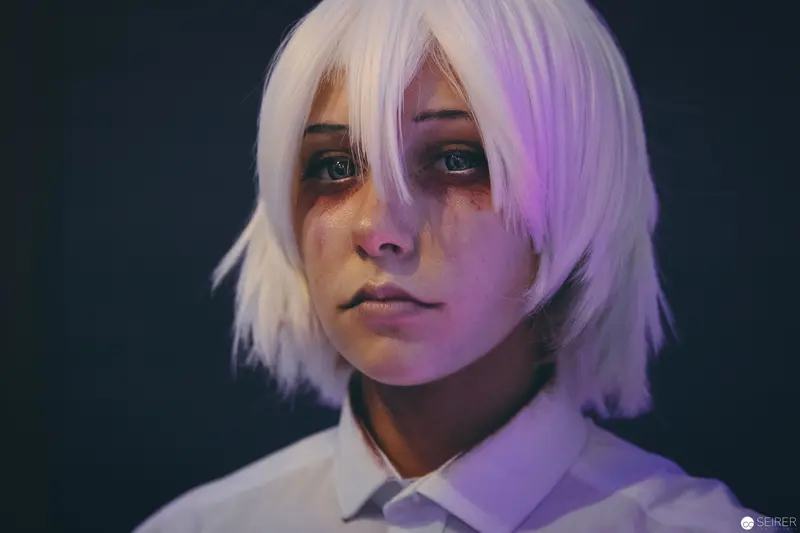 Ethereal Portrait with Lavender Lighting and Platinum Blonde Hairstyle