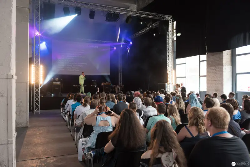 AniNite 2018 Audience Gathered for Performance Under Dramatic Stage Lighting