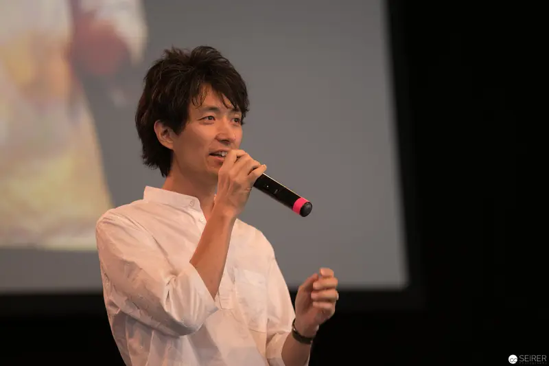 AniNite 2018: Performer Singing with Microphone in White Shirt