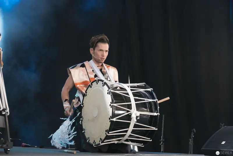 Intense Drummer Performing on Large Percussion Instrument at AniNite 2018