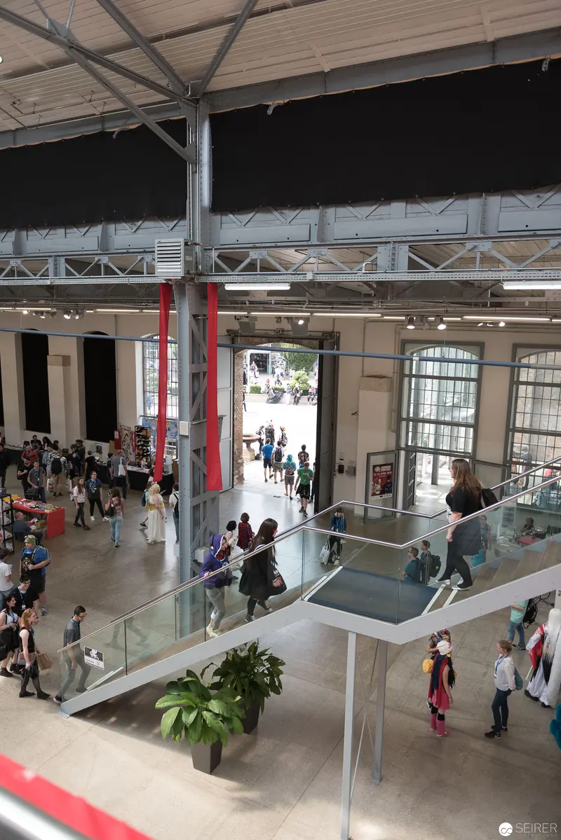 Interior View of Modern Exhibition Space with Multilevel Glass Walkways
