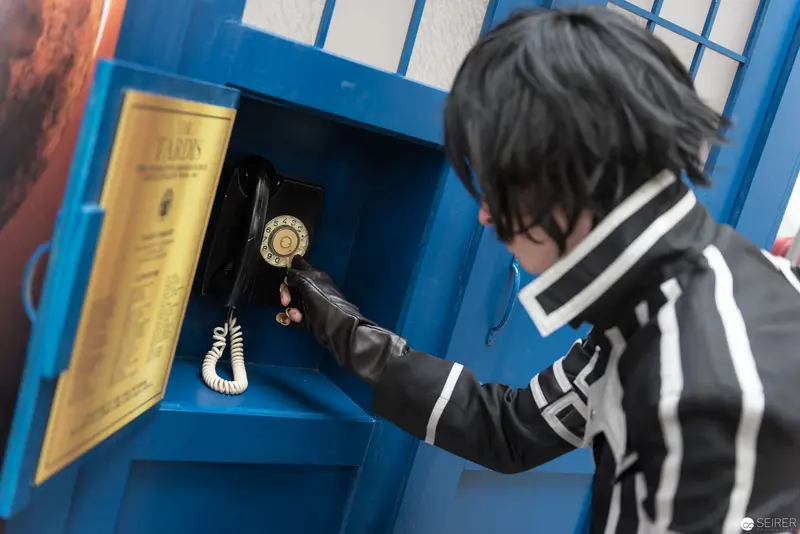 Costumed Performer Accessing Mysterious Blue Artifact Cabinet at AniNite 2018