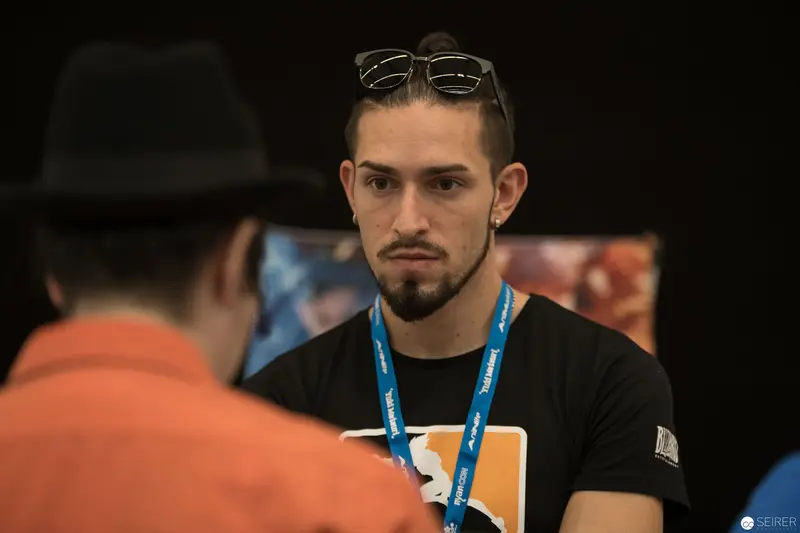 Conference Attendee in Black Shirt with Lanyard at AniNite 2018 Event