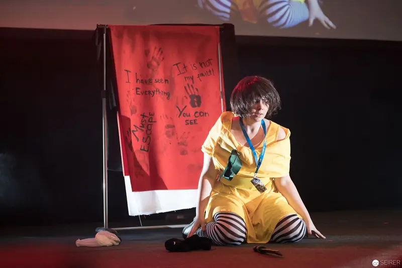 Costumed Performer in Yellow Dress at AniNite 2018 Performance Event