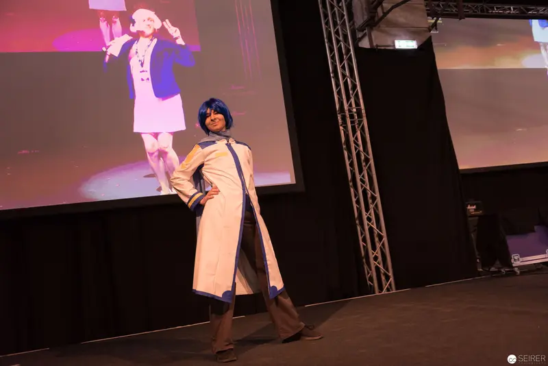 Cosplayer in Blue Wig Performing at AniNite 2018 Anime Convention
