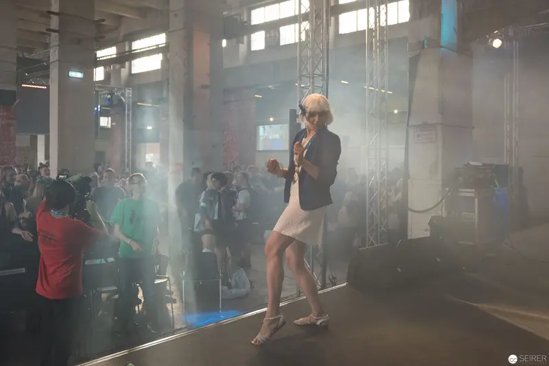 Stage Performance in Dramatic Lighting at AniNite 2018 Concert Event