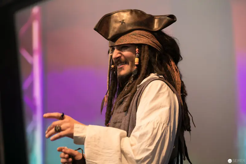 Pirate-Costumed Performer Smiling at AniNite 2018 Performance Event
