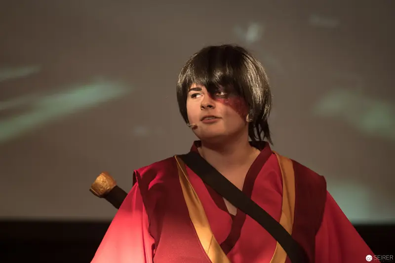 AniNite 2018: Performer in Red Robe with Dramatic Stage Lighting