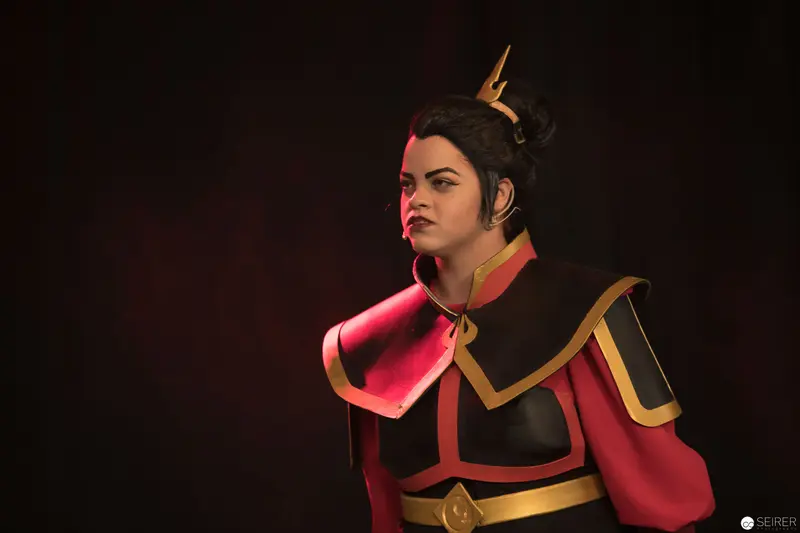 Cosplay Portrayal of Firebending Royalty in Dramatic Studio Lighting