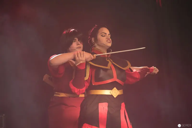 Cosplay Performers Wielding Traditional Weapon at AniNite 2018 Performance