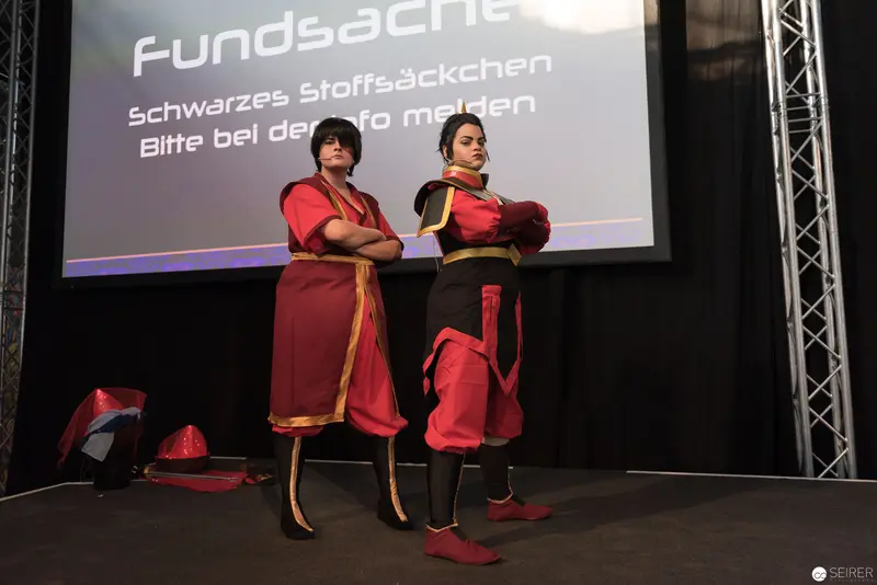 Fundgeschen Event Performers in Red and Black Stage Costumes