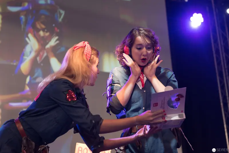 AniNite 2018: Two Performers Interacting on Stage with Dynamic Lighting