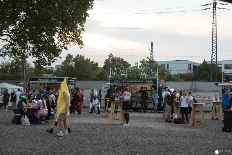 Wrap Stars Food Stall at Outdoor Community Event with Diverse Attendees