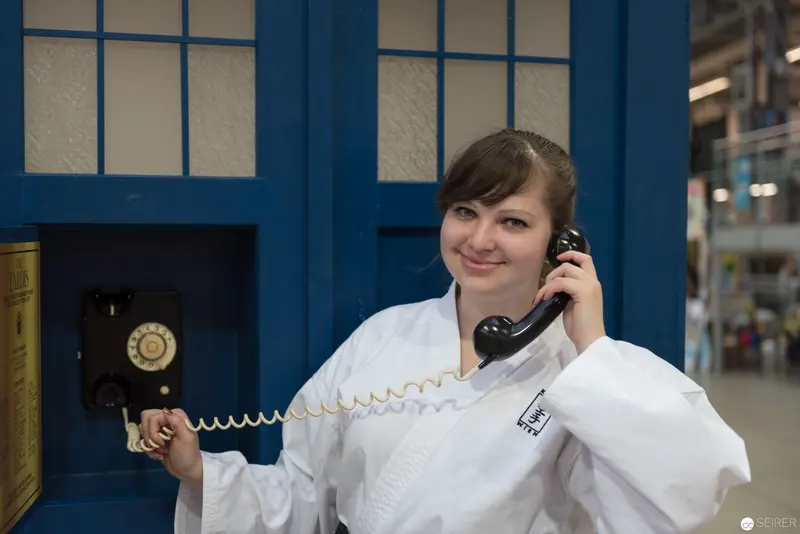 Vintage Telephone Interaction in White Laboratory Setting
