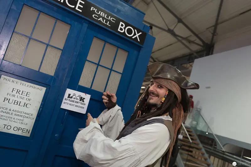 Costumed Performer Beside TARDIS at Public Event