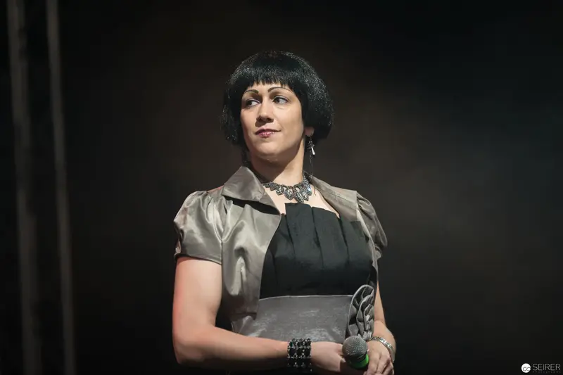 Female Performer in Elegant Stage Attire at AniNite 2018 Event
