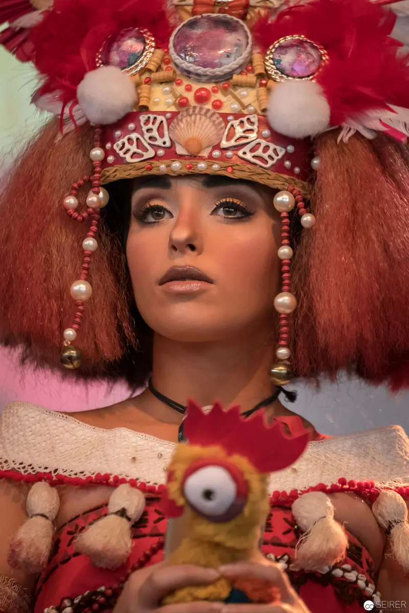 Elaborate Peruvian Festive Costume with Vibrant Headdress and Ornate Accessories