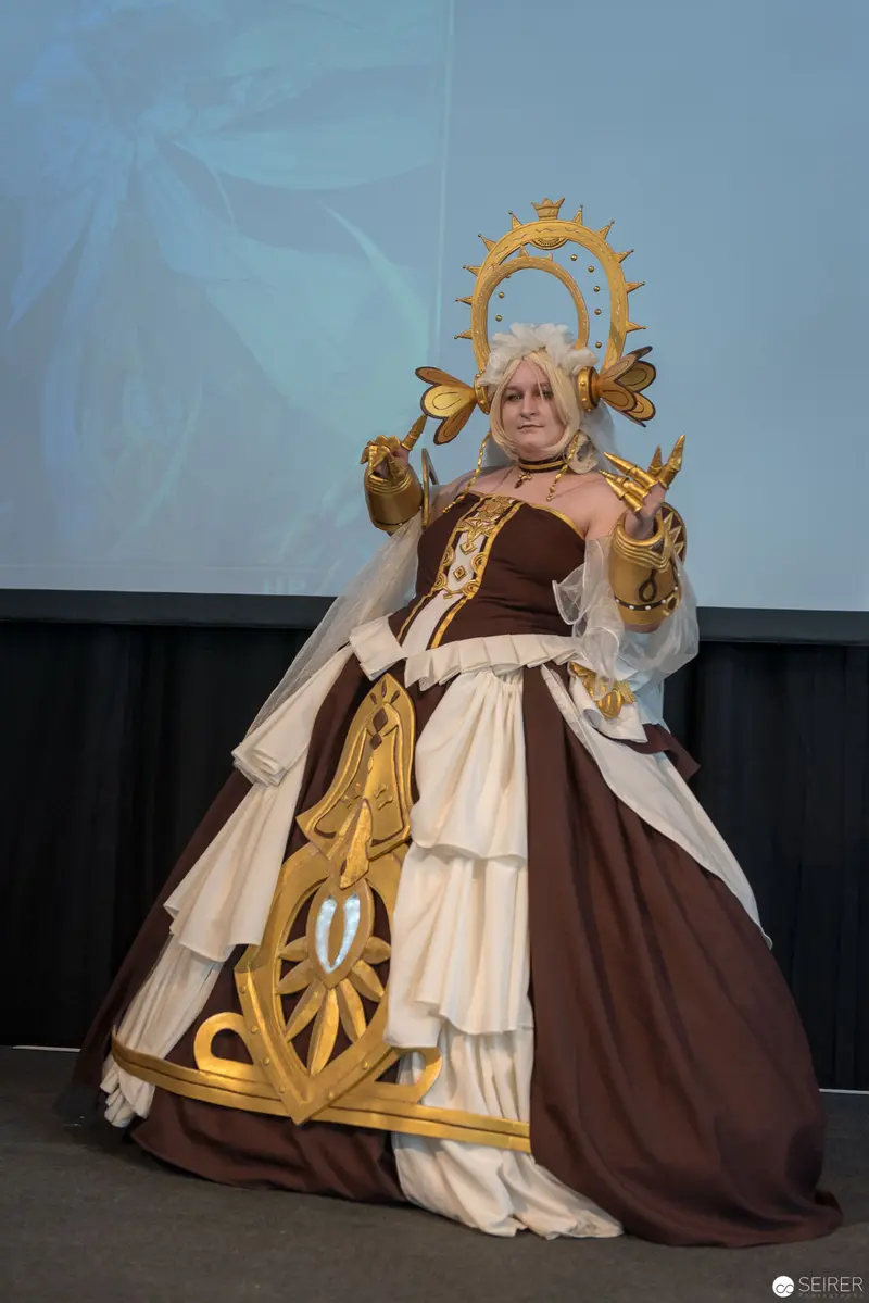 Elaborate Cosplay Costume at AniNite 2018 Featuring Ornate Gold and Brown Design