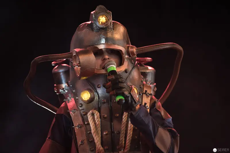 Steampunk Cybernetic Miner with Illuminated Helmet and Mechanical Apparatus