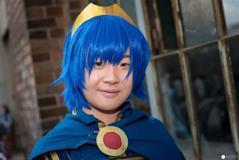 Blue-Haired Cosplayer in Anime Costume at AniNite 2018 Convention