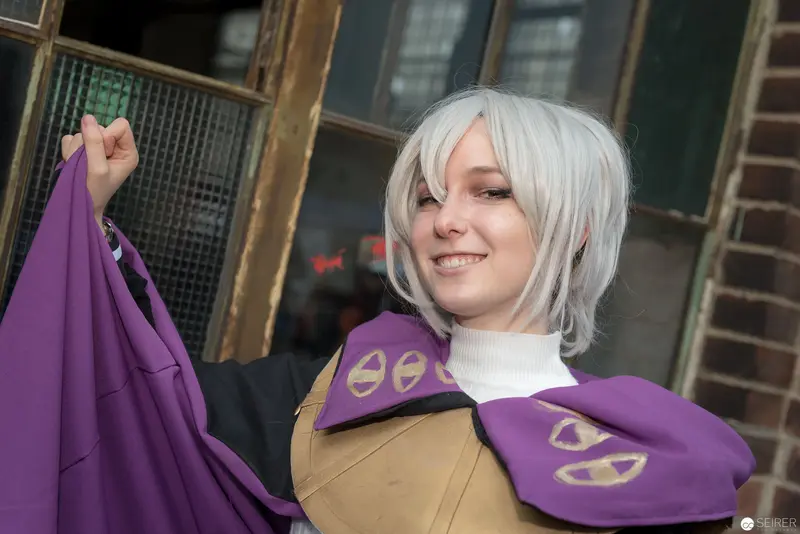 Cosplay Portrait with Purple Accents at Anime Convention