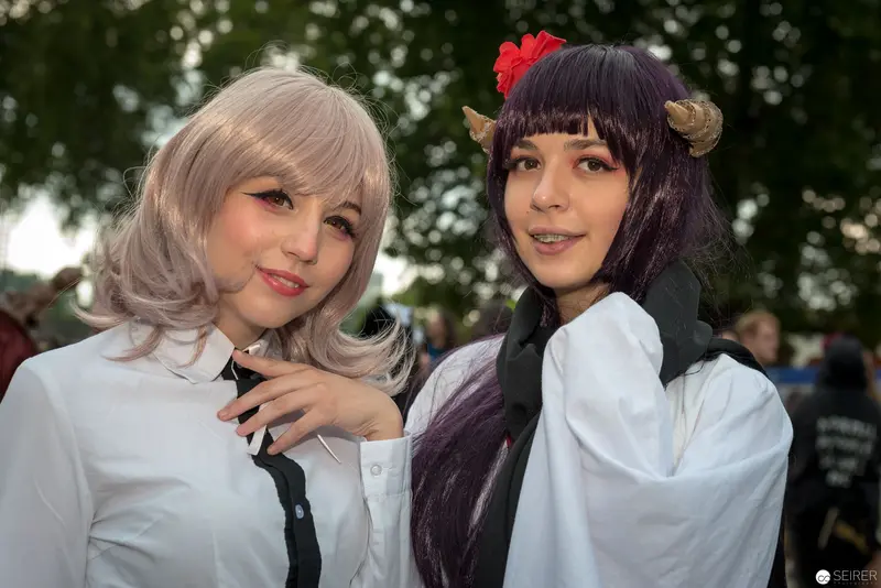 Cosplay Duo in White Shirts at AniNite 2018 Anime Convention