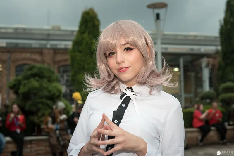 Cosplayer in White at AniNite 2018 Convention