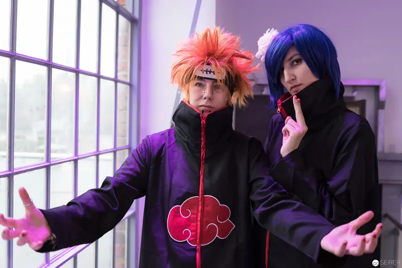 Naruto Cosplay Performers in Purple-Tinted Performance Space at AniNite 2018
