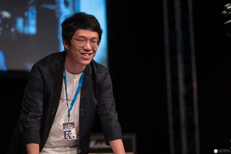 Smiling Speaker at AniNite 2018 Conference in Engaging Presentation Moment